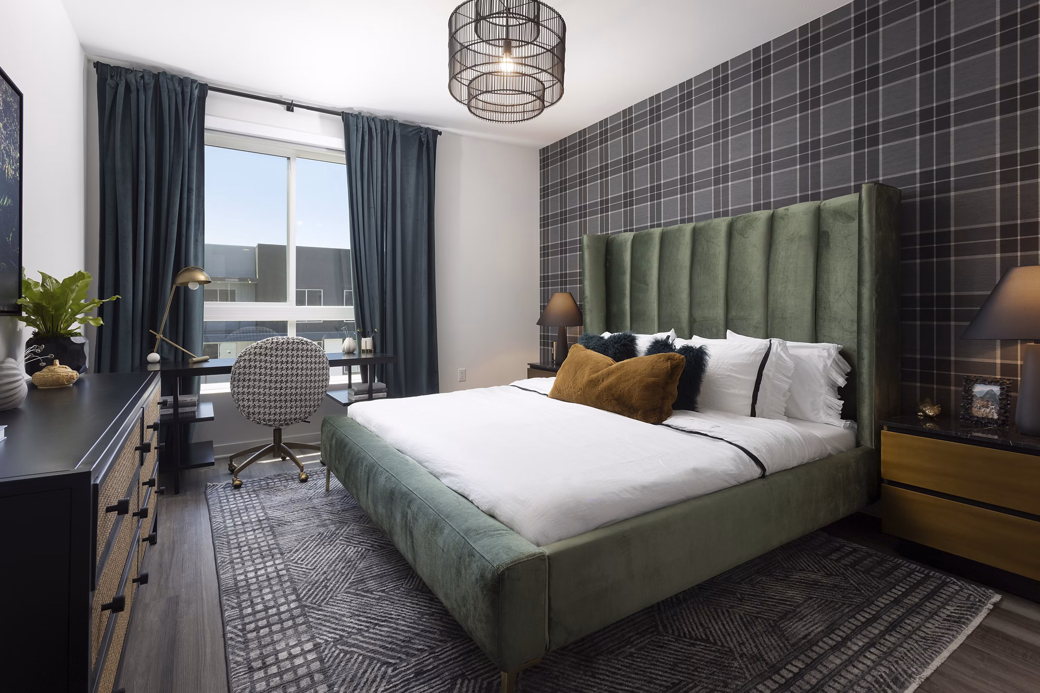 Spacious bedroom with modern decor and large windows at Broadstone Edition Apartments