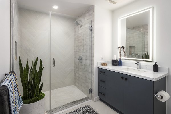 Modern bathroom with sleek fixtures at Broadstone Edition Apartments, featuring a luxurious design perfect for upscale living