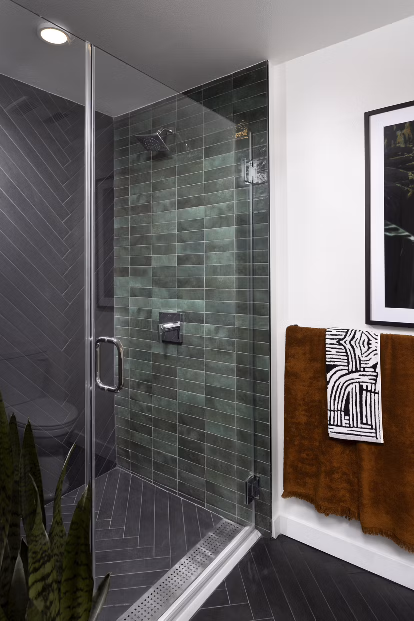 Luxury bathroom with dual sinks and elegant fixtures at Broadstone Edition Apartments