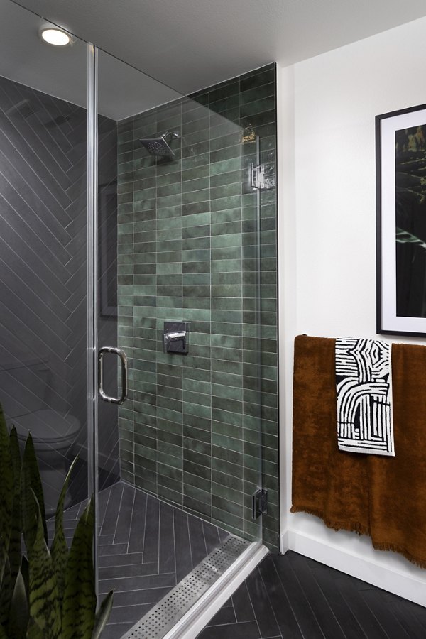 Luxury bathroom with dual sinks and elegant fixtures at Broadstone Edition Apartments