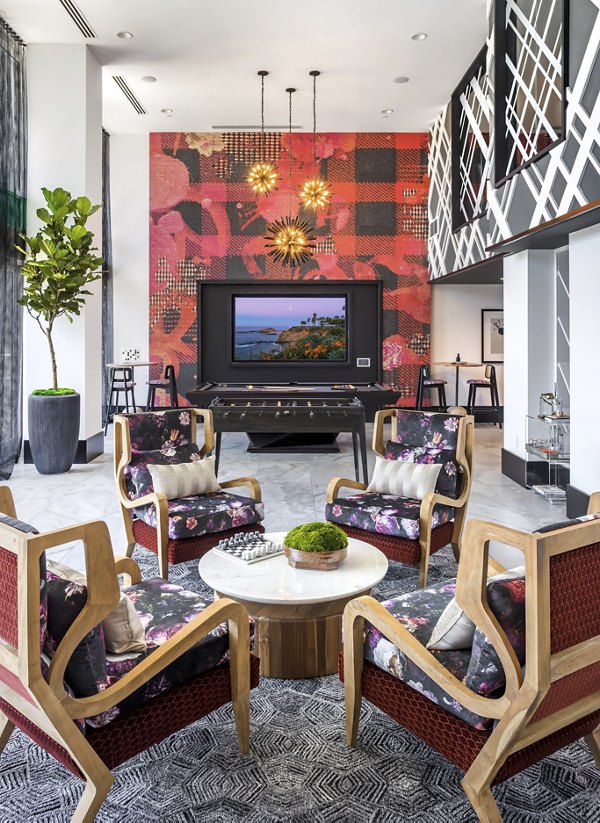 Clubhouse featuring modern decor and seating at Broadstone Edition Apartments