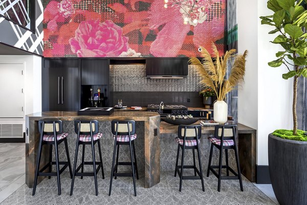 Clubhouse with modern design and seating areas at Broadstone Edition Apartments