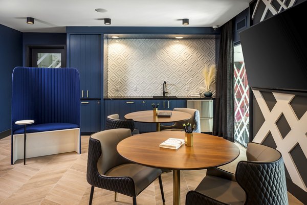 Clubhouse with modern design and social seating at Broadstone Edition Apartments