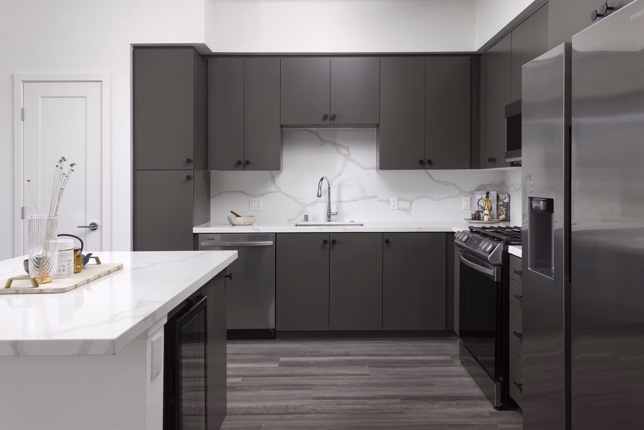 Modern kitchen with sleek appliances at Broadstone Edition Apartments