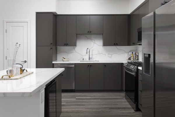 Modern kitchen with sleek appliances at Broadstone Edition Apartments