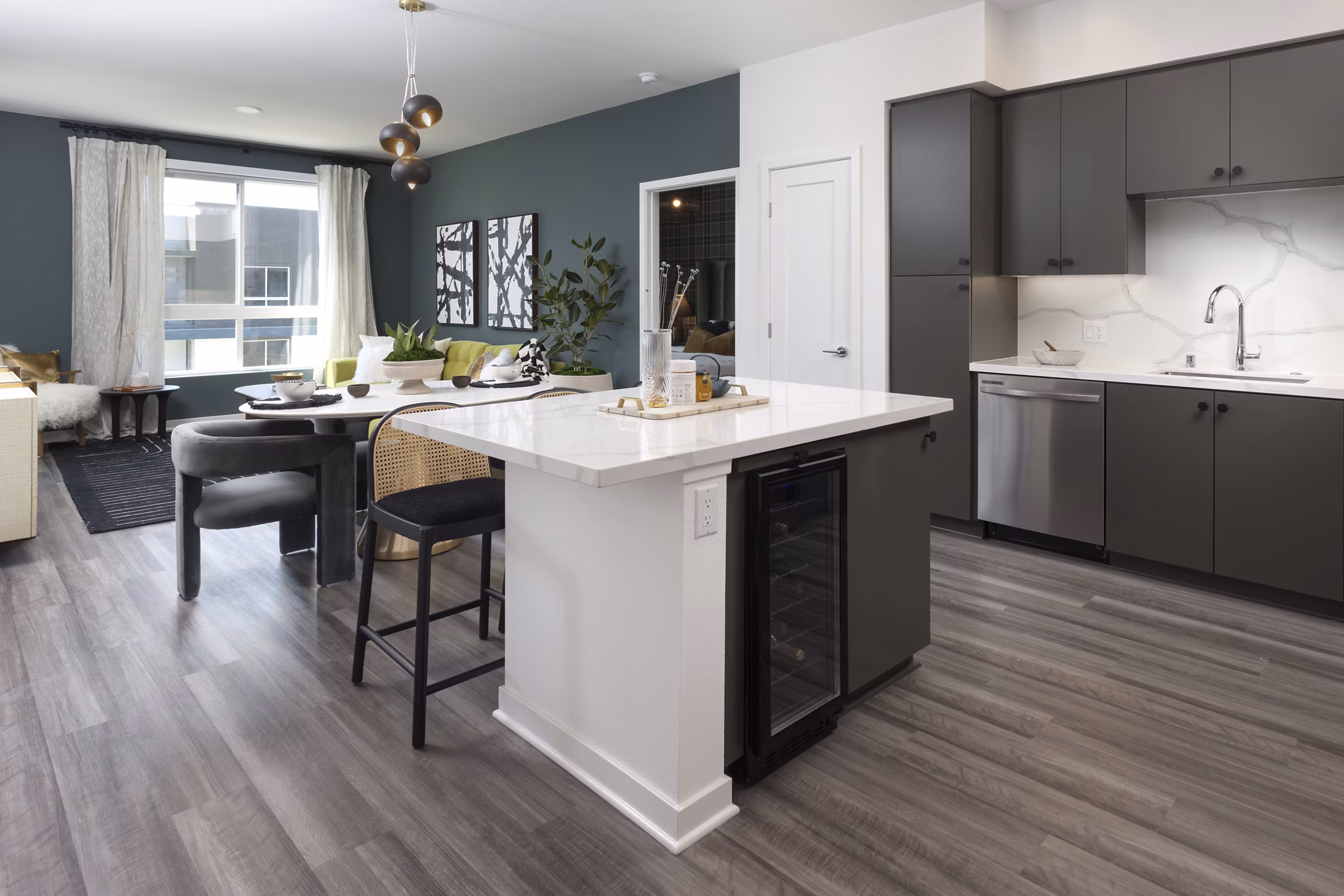 Modern kitchen with stainless steel appliances at Broadstone Edition Apartments