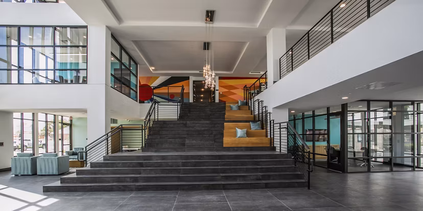 Clubhouse featuring modern design and luxury seating at theApex @ Meadows Apartments