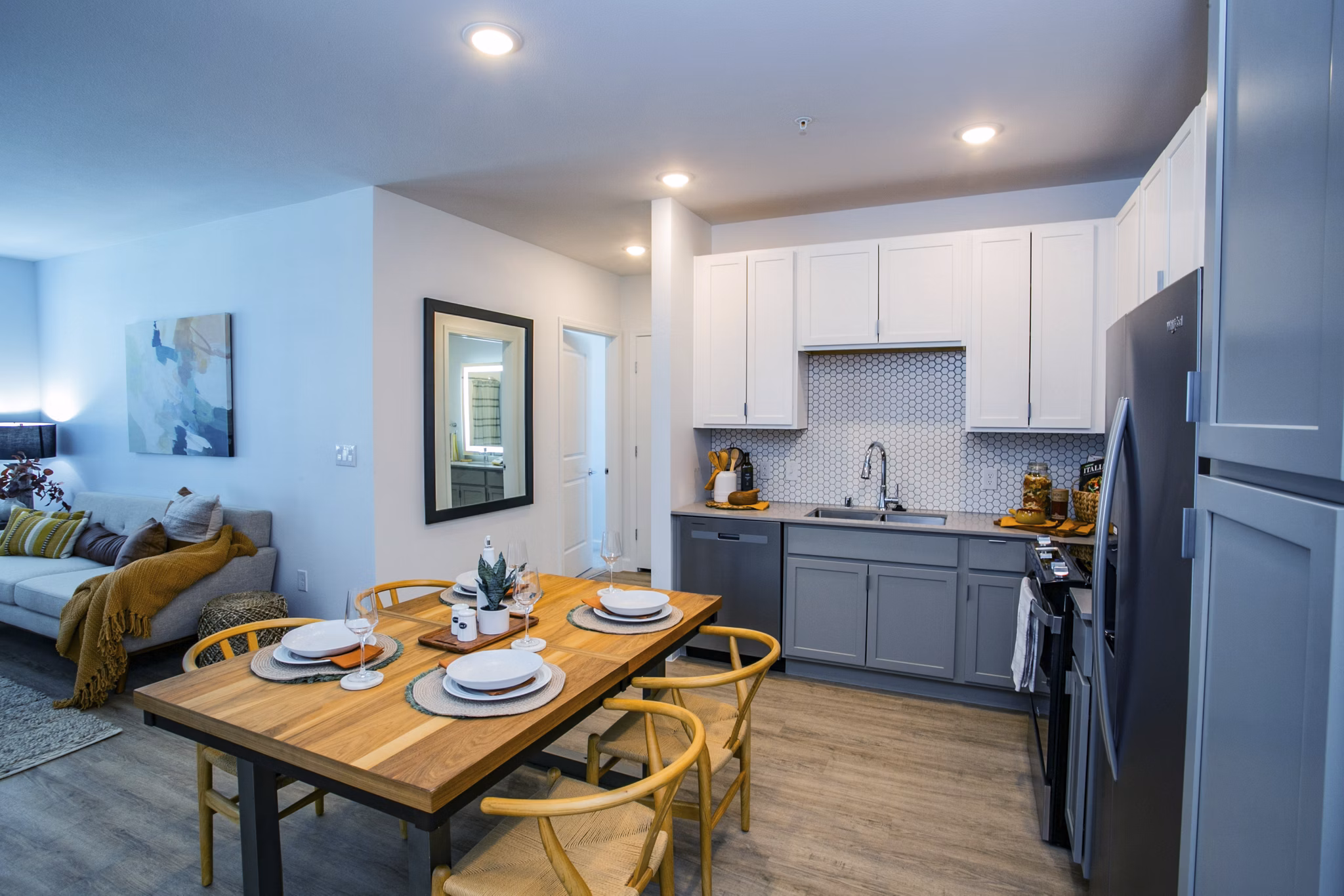 Modern dining area with sleek furnishings at theApex @ Meadows Apartments, offering luxury living and high-end amenities