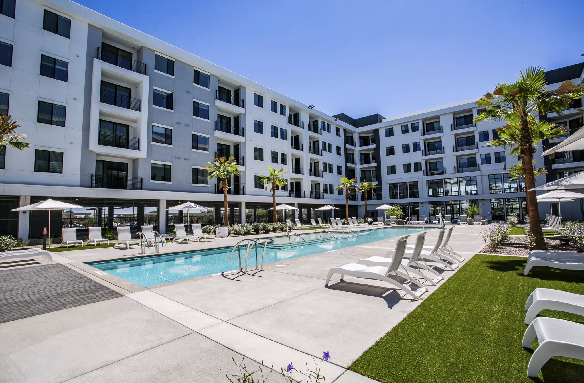 Luxurious outdoor pool at The Apex @ Meadows Apartments, perfect for relaxation and leisure