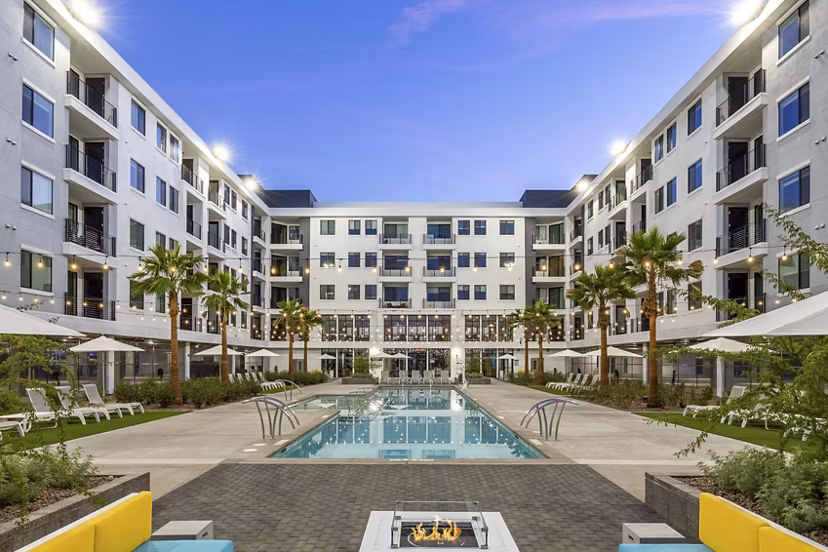 Rooftop pool with scenic views at theApex @ Meadows Apartments for luxury living