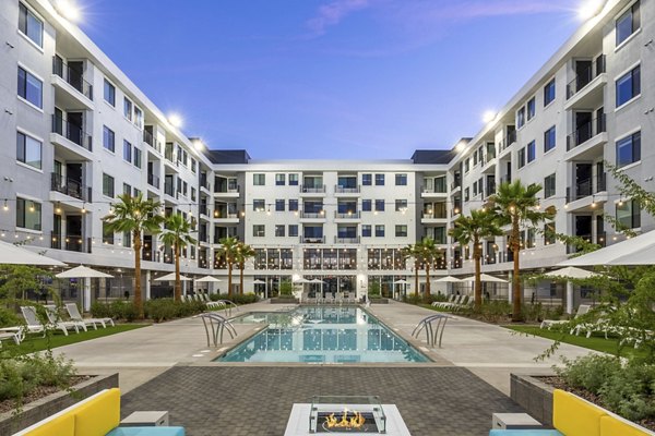 Rooftop pool with scenic views at theApex @ Meadows Apartments for luxury living