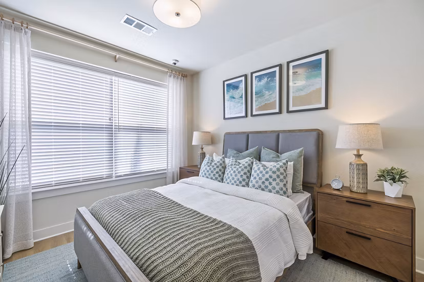 Spacious bedroom with modern decor and large windows at Birchway Spring Cypress Apartments