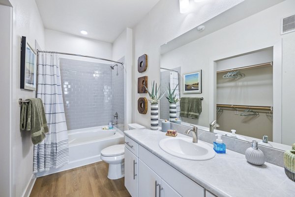Bathroom featuring elegant fixtures and modern design at Birchway Spring Cypress Apartments