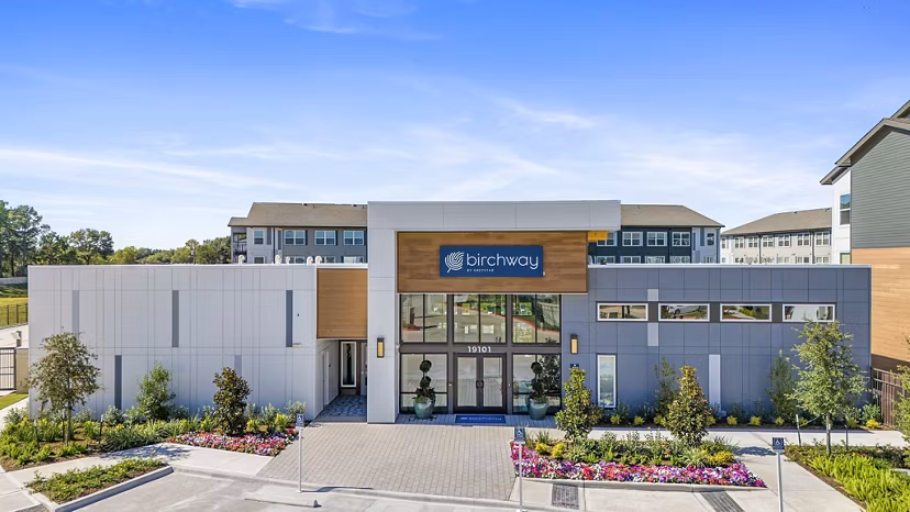 Clubhouse lobby featuring modern design elements at Birchway Spring Cypress Apartments
