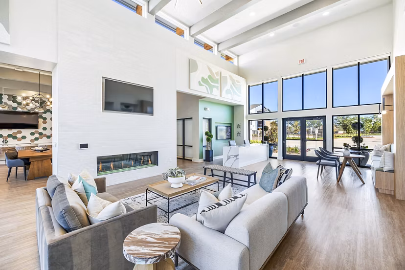 Clubhouse lobby featuring modern seating and elegant decor at Birchway Spring Cypress Apartments
