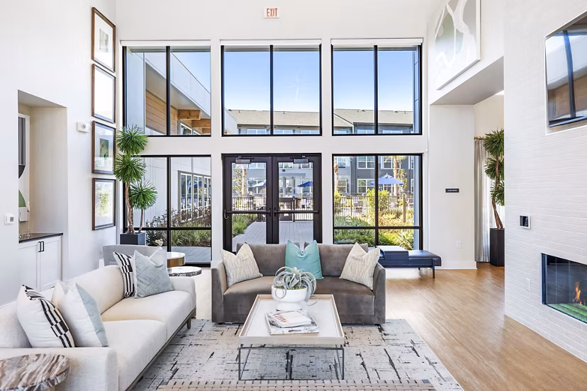 Modern clubhouse lobby with sleek furnishings at Birchway Spring Cypress Apartments