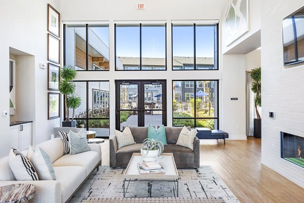 Modern clubhouse lobby with sleek furnishings at Birchway Spring Cypress Apartments