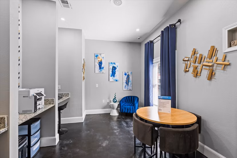 Modern business center with coworking space at Madison at Melrose Apartments