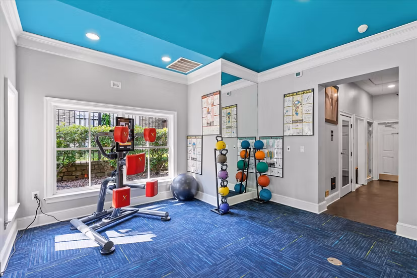 State-of-the-art fitness center with modern equipment at Madison at Melrose Apartments