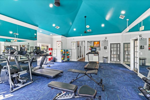 State-of-the-art fitness center featuring modern equipment at Madison at Melrose Apartments