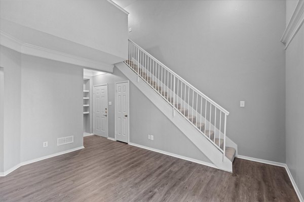 Modern kitchen with stainless steel appliances in Madison at Melrose Apartments