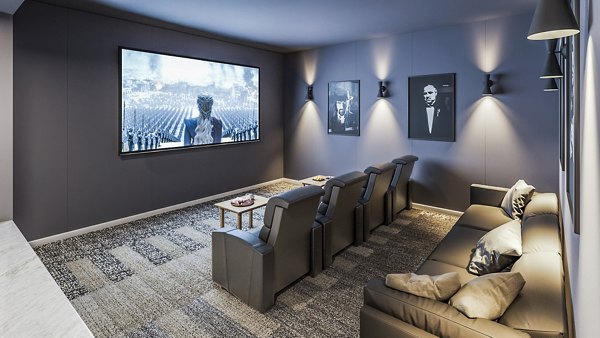 Modern theater with plush seating at Traverse Apartments, perfect for movie nights and entertainment