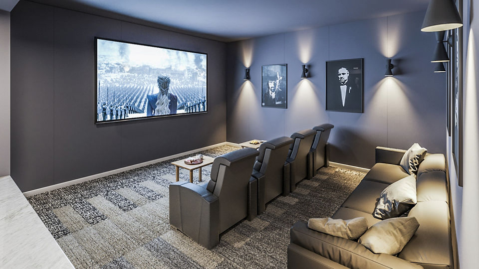 Modern theater with plush seating at Traverse Apartments, perfect for movie nights and entertainment