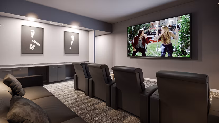 Traverse Apartments: Modern theater room with comfortable seating and large screen at luxury apartments