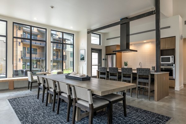 State-of-the-art meeting facility at Traverse North Bend Apartments with modern AV equipment and spacious seating