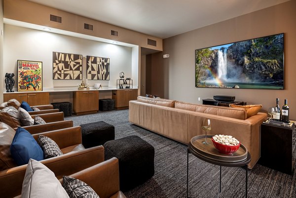 Modern theater room with plush seating at Traverse North Bend Apartments, perfect for entertainment and movie nights