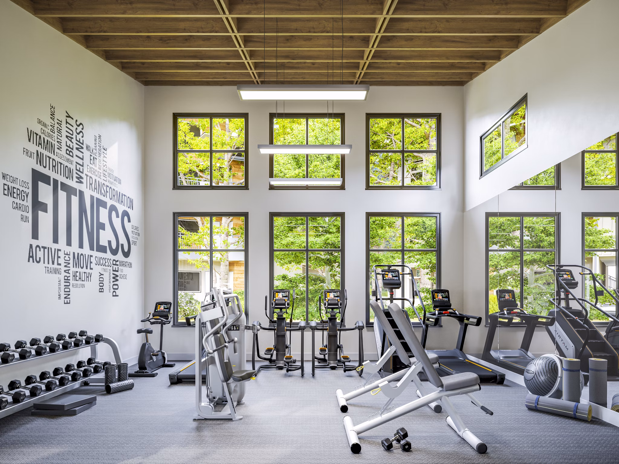 Fitness center with state-of-the-art equipment at Traverse Apartments, offering a modern workout environment