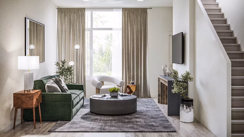 Spacious living room with modern decor at Traverse Apartments