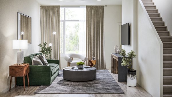 Spacious living room with modern decor at Traverse Apartments