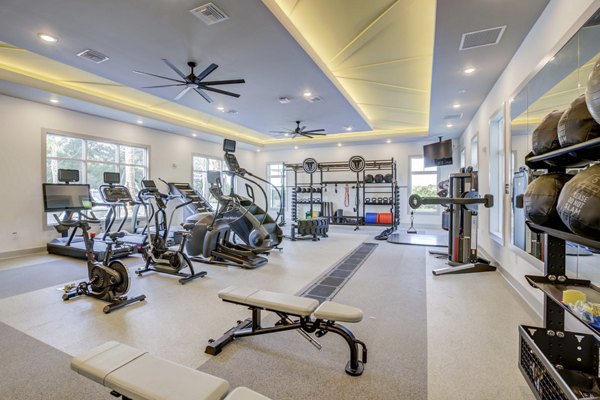 Modern fitness center featuring state-of-the-art equipment at Inscribe Apartments