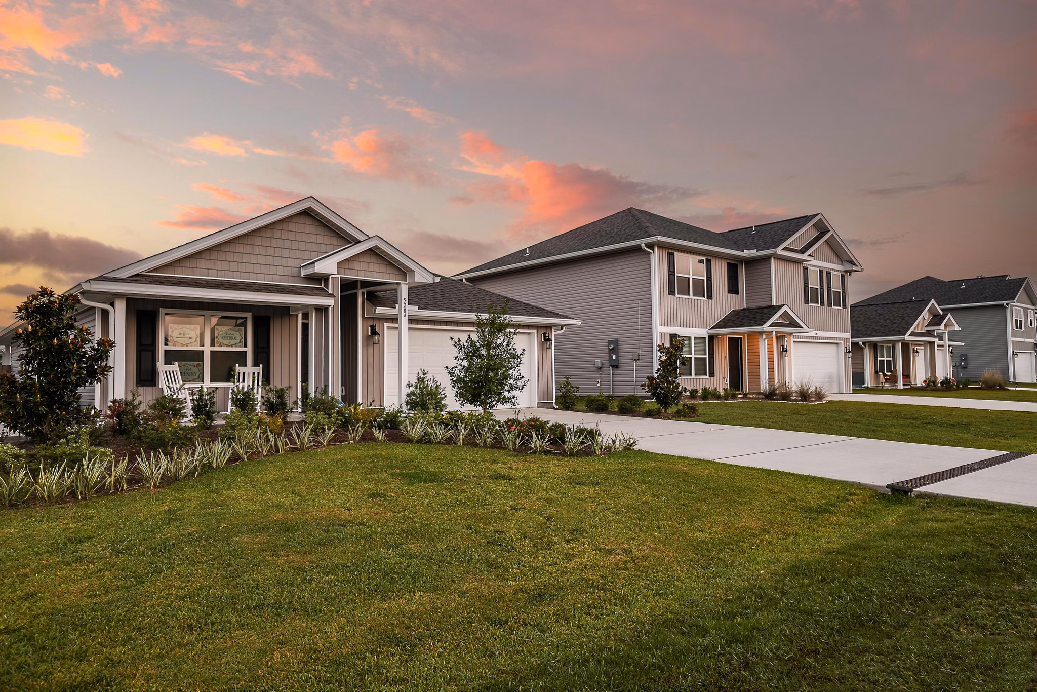 Sunset Village Apartments: Scenic garden pathways at luxury residence in a prime location
