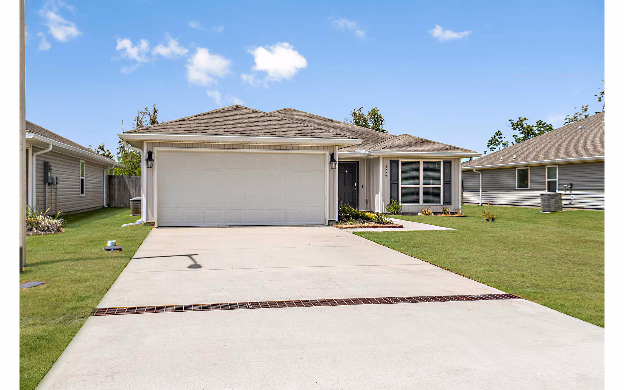 Sunset Village Apartments: Elegant view of luxury apartments in a serene neighborhood setting