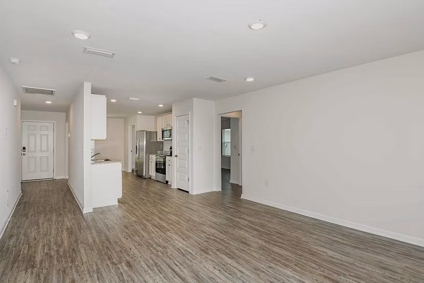 Spacious kitchen with modern appliances in Sunset Village Apartments