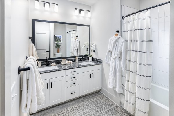 Bathroom featuring sleek fixtures and modern design in Elan Brookwood Apartments