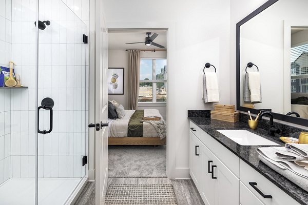 Luxurious bathroom with elegant fixtures at Elan Brookwood Apartments in Atlanta, showcasing premium design and modern amenities