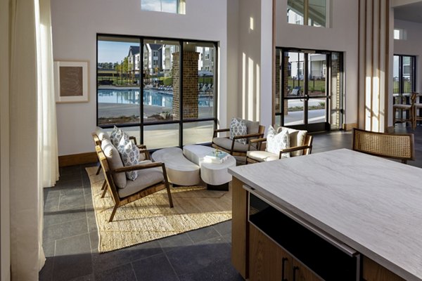 Clubhouse with modern design and seating at Elan Brookwood Apartments