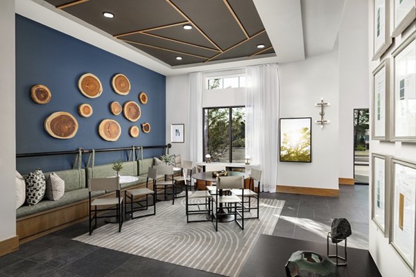 Modern clubhouse with stylish decor at Elan Brookwood Apartments, perfect for social gatherings and community events