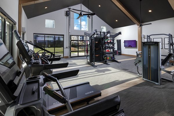 Fitness center with modern equipment at Elan Brookwood Apartments in Atlanta for active luxury living