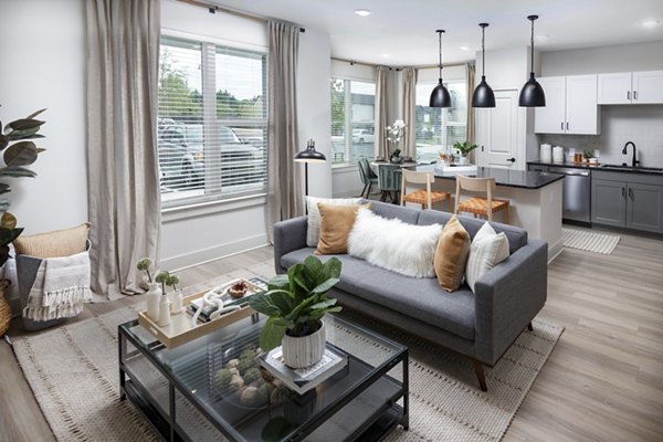 Contemporary living room with modern furnishings at Elan Brookwood Apartments