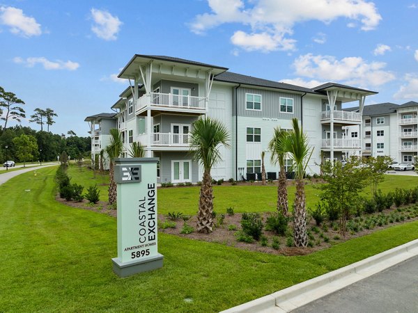 Coastal Exchange Apartments: Modern luxury apartments in coastal location, showcasing sleek architecture and inviting green spaces