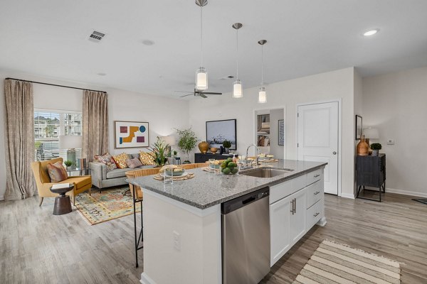 Elegant bedroom with modern furnishings at Coastal Exchange Apartments