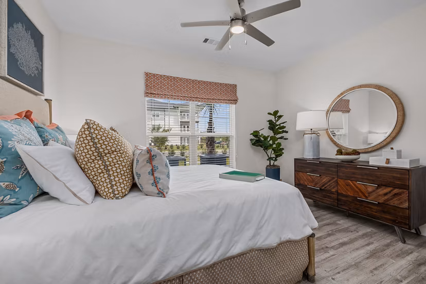 Bedroom featuring modern furniture and ocean views at Coastal Exchange Apartments, luxury living