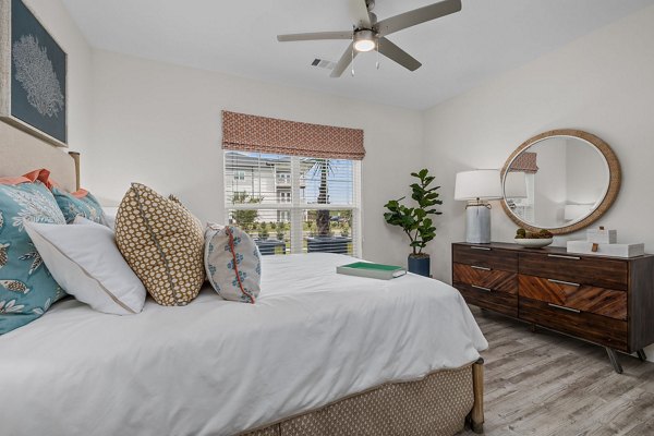 Bedroom featuring modern furniture and ocean views at Coastal Exchange Apartments, luxury living