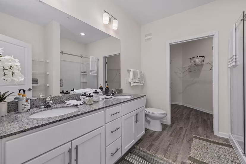 Modern bathroom with sleek fixtures at Coastal Exchange Apartments