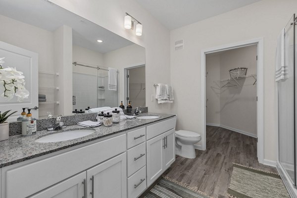 Modern bathroom with sleek fixtures at Coastal Exchange Apartments