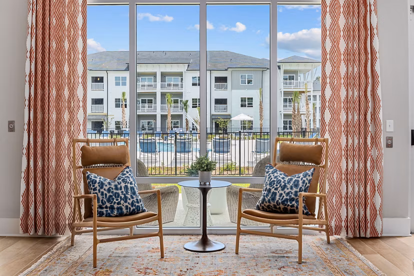 Clubhouse with modern design at Coastal Exchange Apartments offering luxury amenities for residents' enjoyment